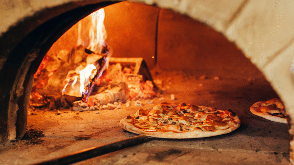 From Naples to Your Plate — The Story of Our Wood-Fired Pizza